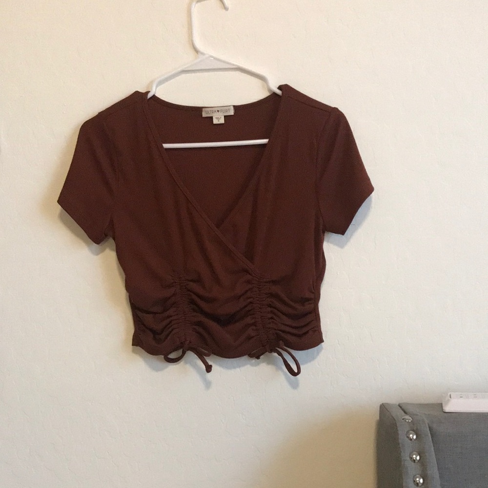 very cute comfy shirt ruffles at end